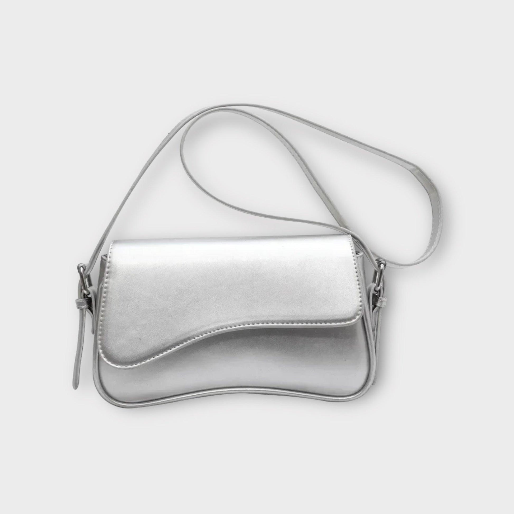 Silberne Umhängetasche aus Leder, modisches Accessoire für Damen, elegantes Design.