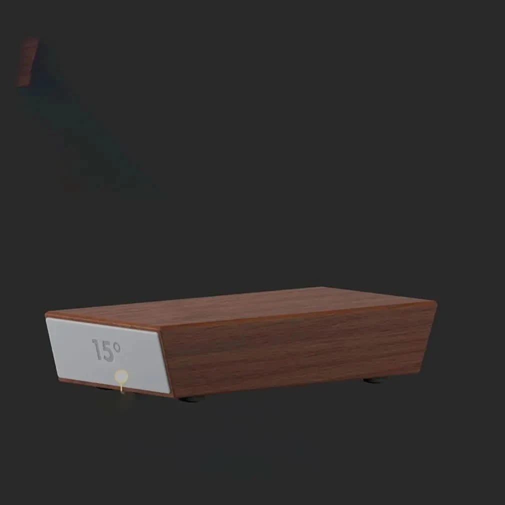 Trapezförmiger Winkelblock aus Holz mit grauer Stirnfläche für den 15-Grad-Winkel, vor dunklem Hintergrund freigestellt. 3