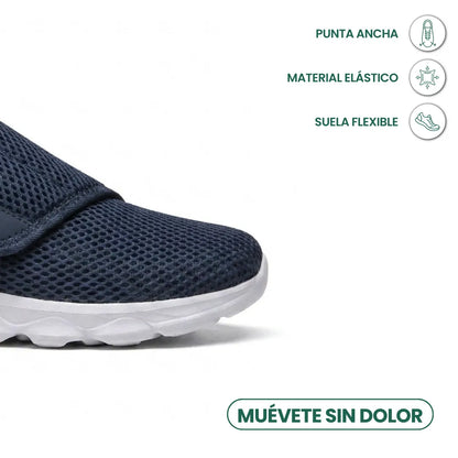 Detailansicht der breiten Schuhspitze des marineblauen Netzschuhs, daneben Symbole zu weiter Spitze, elastischem Material und flexibler Sohle. 5