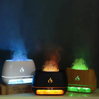 Drei Aromadiffusoren mit LED-Flammen, schwarz, weiß, holzoptik, stimmungsvolle Beleuchtung.