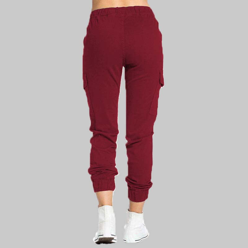 Rote Damen-Jogginghose, Baumwolle, elastischer Bund, seitliche Taschen, sportlich, bequem.