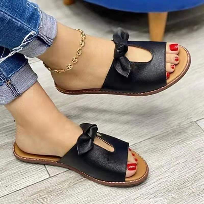 Schwarze Ledersandalen mit Schleife, Damenmode, Sommerschuhe, bequem, elegant, Freizeit.