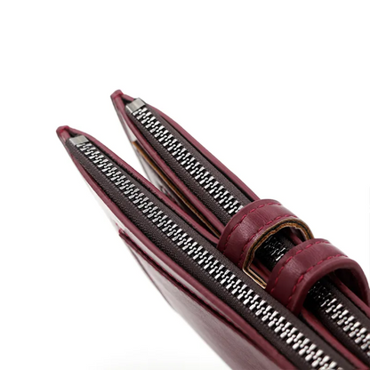 Rote lange Leder-Geldbörse mit Reißverschluss, schlankes Design, stilvoll und elegant.