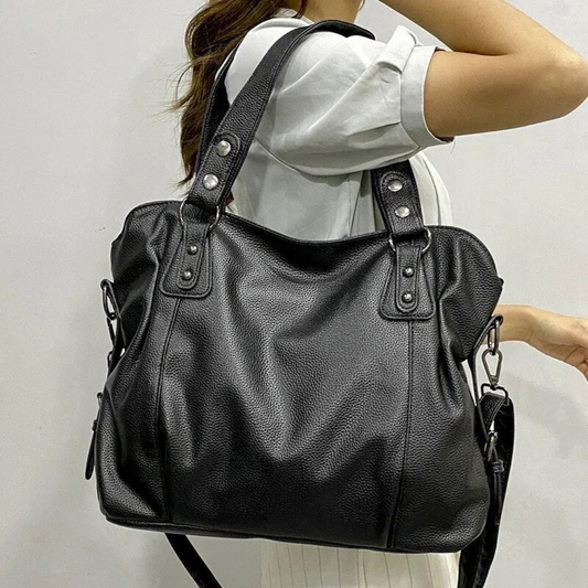 Schwarze Lederhandtasche mit Schulterriemen, Damenmode, elegant und geräumig.