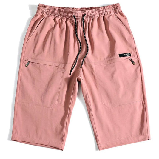 Rosa Herren-Shorts mit Kordelzug, Taschen, Reißverschlüssen, lässig, bequem, Sommermode.
