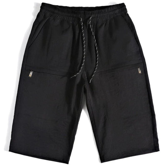 Schwarze Herren-Shorts aus Baumwolle mit Kordelzug, Taschen, sportlich, bequem.