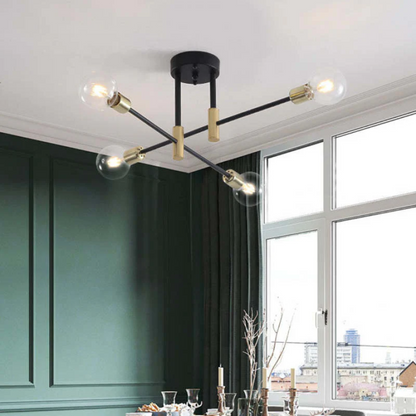 Moderne schwarze Deckenleuchte mit vier Glühbirnen in elegantem Wohnzimmer.