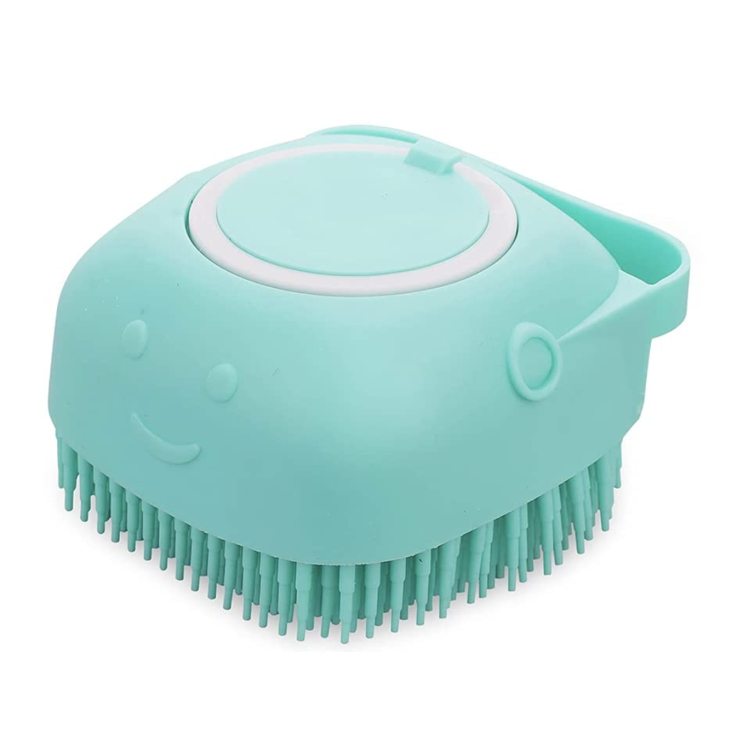 Türkise Silikon-Bürste für Haustiere, ergonomisch, mit weichen Borsten, ideal zur Fellpflege.