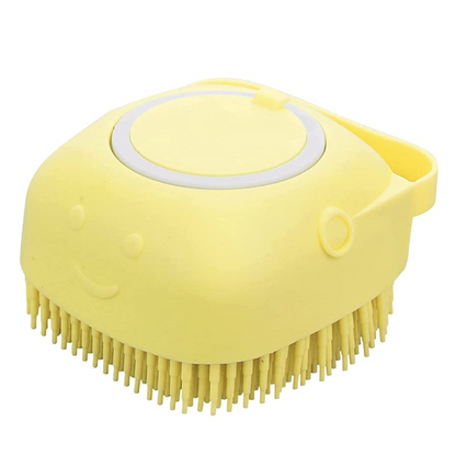 Gelbe Silikon-Bürste mit Smiley-Gesicht, ideal für sanfte Hautreinigung und Massage.
