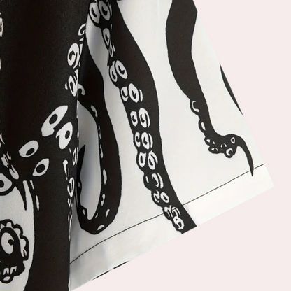 Schwarz-weißes Tintenfisch-Tentakel-Muster auf Stoff, maritimes Design, Baumwolle.