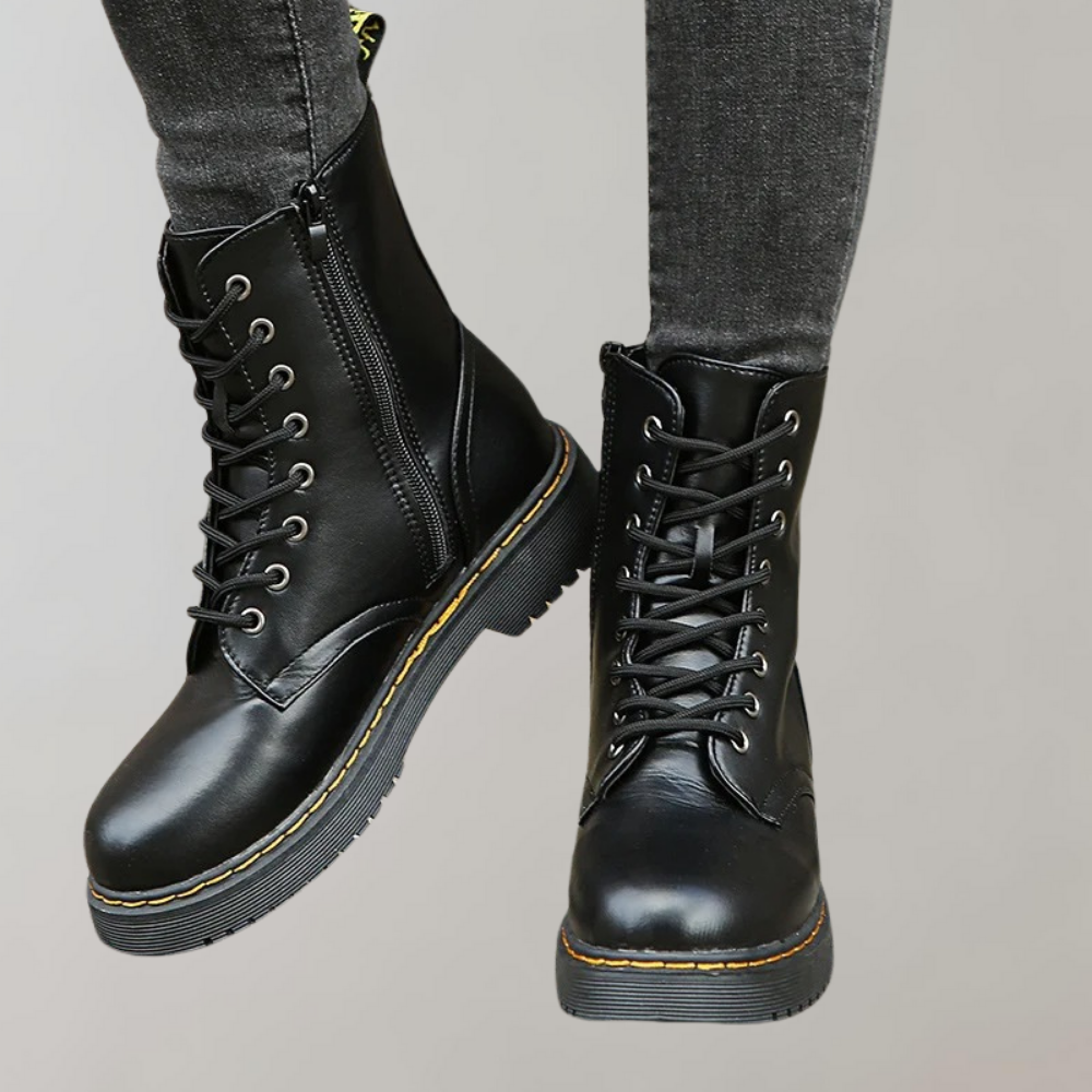 Schwarze Damenstiefel aus Leder, Schnürung, Reißverschluss, robuste Sohle, modisch, bequem.