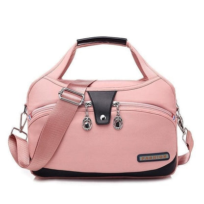 Rosa Damenhandtasche aus Leder mit Schulterriemen, modisch, elegant, vielseitig einsetzbar.