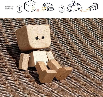 Holzfigur mit lächelndem Gesicht auf geflochtener Unterlage, darüber eine Aufbauanleitung in zwei Schritten. 9