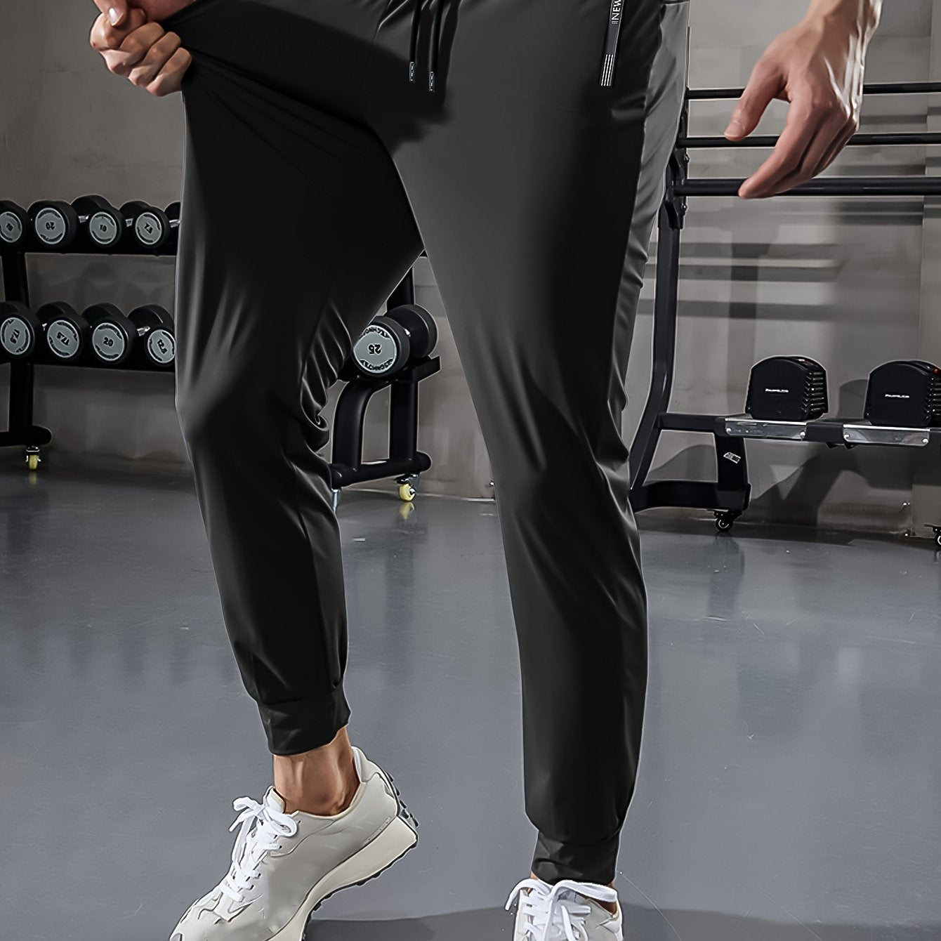 Schwarze Jogginghose Herren, Sportbekleidung, Fitnessstudio, elastisch, bequem, modern.