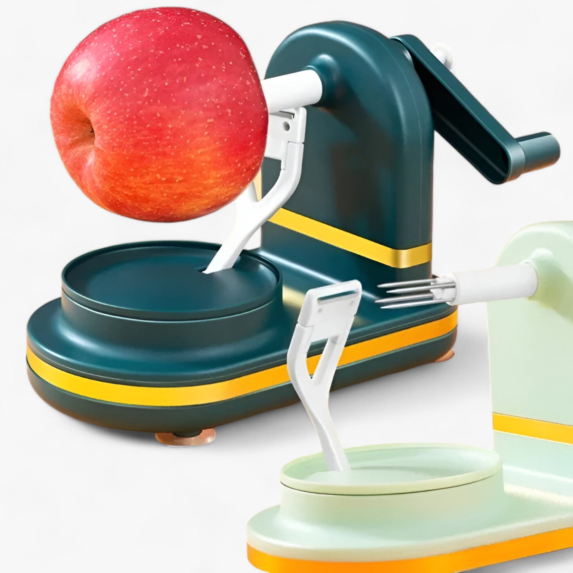 Apfelschäler manuell, grün-gelb, mit rotem Apfel, Küchengerät, Obstschäler, effizient, modern.