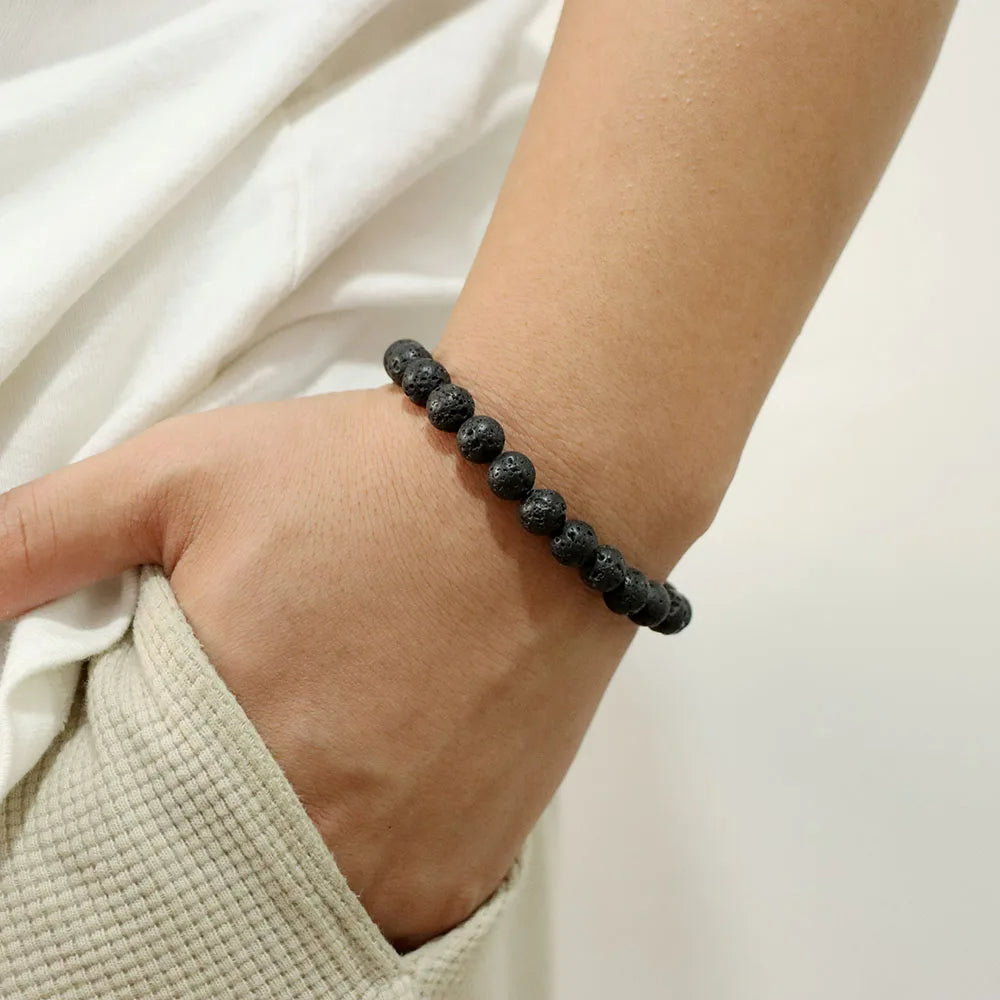 Schwarzes Lavastein-Armband am Handgelenk, lässiger Stil, natürliche Perlen, Unisex-Schmuck.