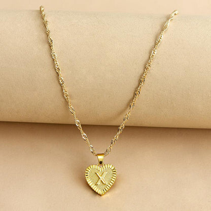 Goldene Herz-Halskette mit Kordelkette, elegantes Schmuckdesign, ideal als Geschenk für Frauen.