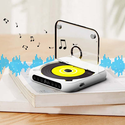 Weißer Player mit transparentem Deckel steht auf einem Stapel Bücher, umgeben von Musiknoten und blauen Schallwellen. 19