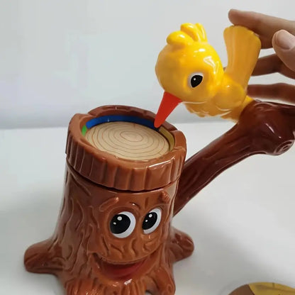 Spielzeug-Vogel auf Baumstumpf, gelb, Kunststoff, Kinder, interaktiv, lustig, Handspielzeug