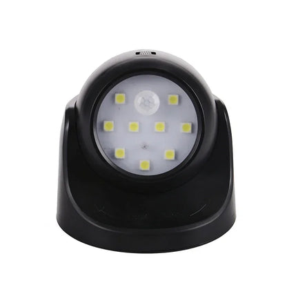 Schwarze LED-Sicherheitsleuchte mit Bewegungssensor, batteriebetrieben, energiesparend.