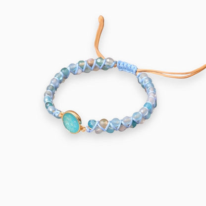 Blaues Perlenarmband mit türkisfarbenem Stein, verstellbar, handgefertigt, modisch.