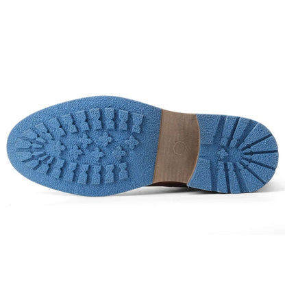 Blaue Gummisohle mit Profil, rutschfest, langlebig, ideal für Outdoor-Schuhe.