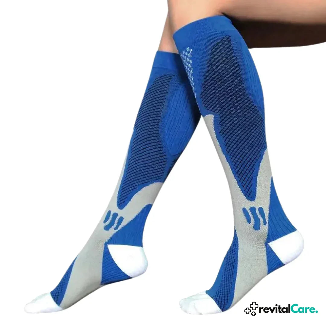 Blaue Kompressionsstrümpfe für Damen, kniehoch, atmungsaktiv, ideal für Sport und Reisen.