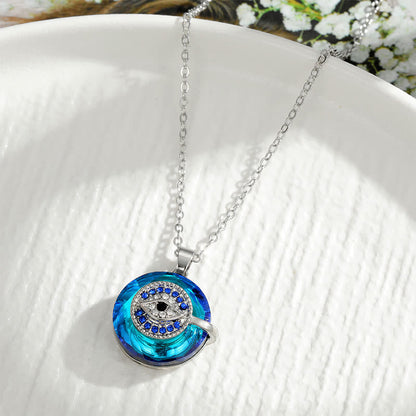Silberkette mit blauem Kristallanhänger, rund, funkelnd, eleganter Schmuck für Damen.