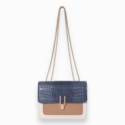 Blaue Krokodilleder-Handtasche mit Kettenriemen, beige und weiße Details, Damenmode.