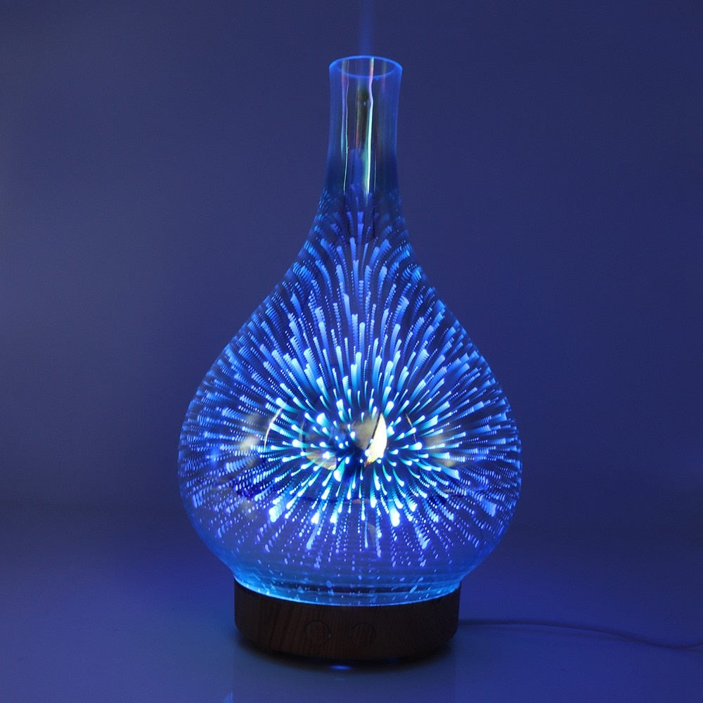 Blauer LED-Aromadiffusor, Glas, Tropfenform, Holzsockel, stimmungsvolle Beleuchtung, Raumduft.