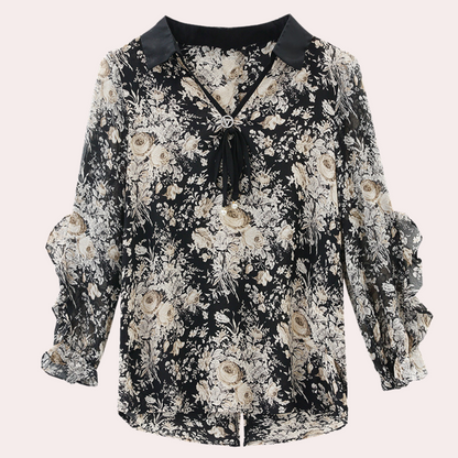 Schwarze Damenbluse mit Blumenmuster, V-Ausschnitt und langen Ärmeln, elegant und modisch.
