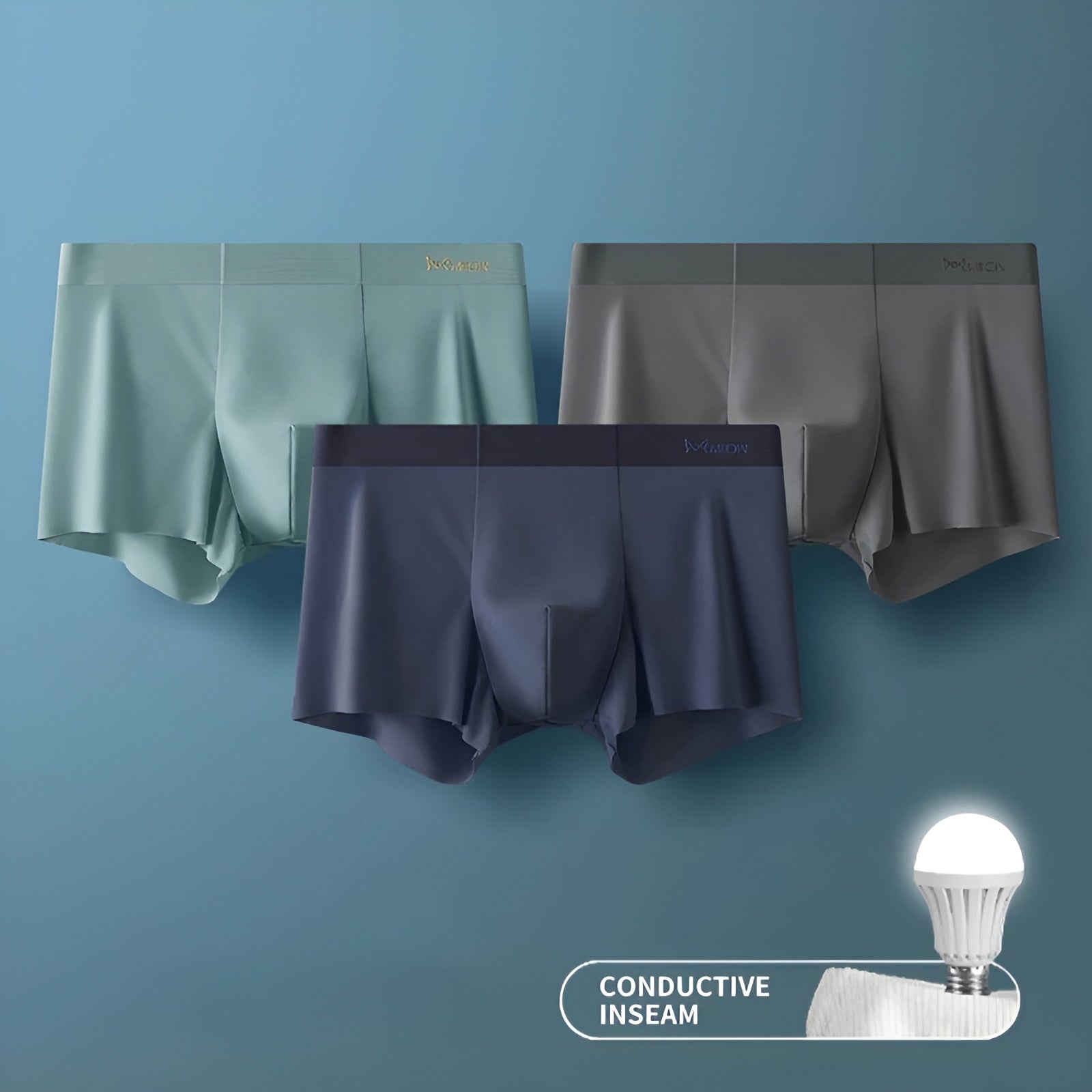 Drei Herren-Boxershorts in Blau, Grau und Grün, nahtlos, atmungsaktiv, mit leitfähiger Naht.
