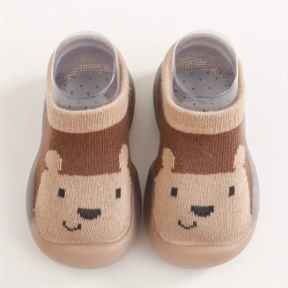 Braune Babyschuhe mit Bärenmotiv, rutschfest, weiche Sohle, Strickmaterial, Unisex.