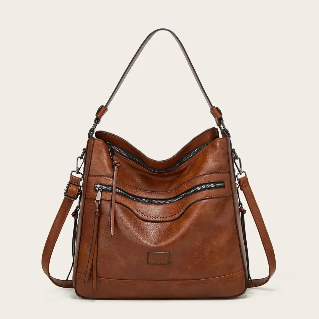 Braune Lederhandtasche mit Reißverschlüssen, verstellbarem Schulterriemen, modisch, elegant.