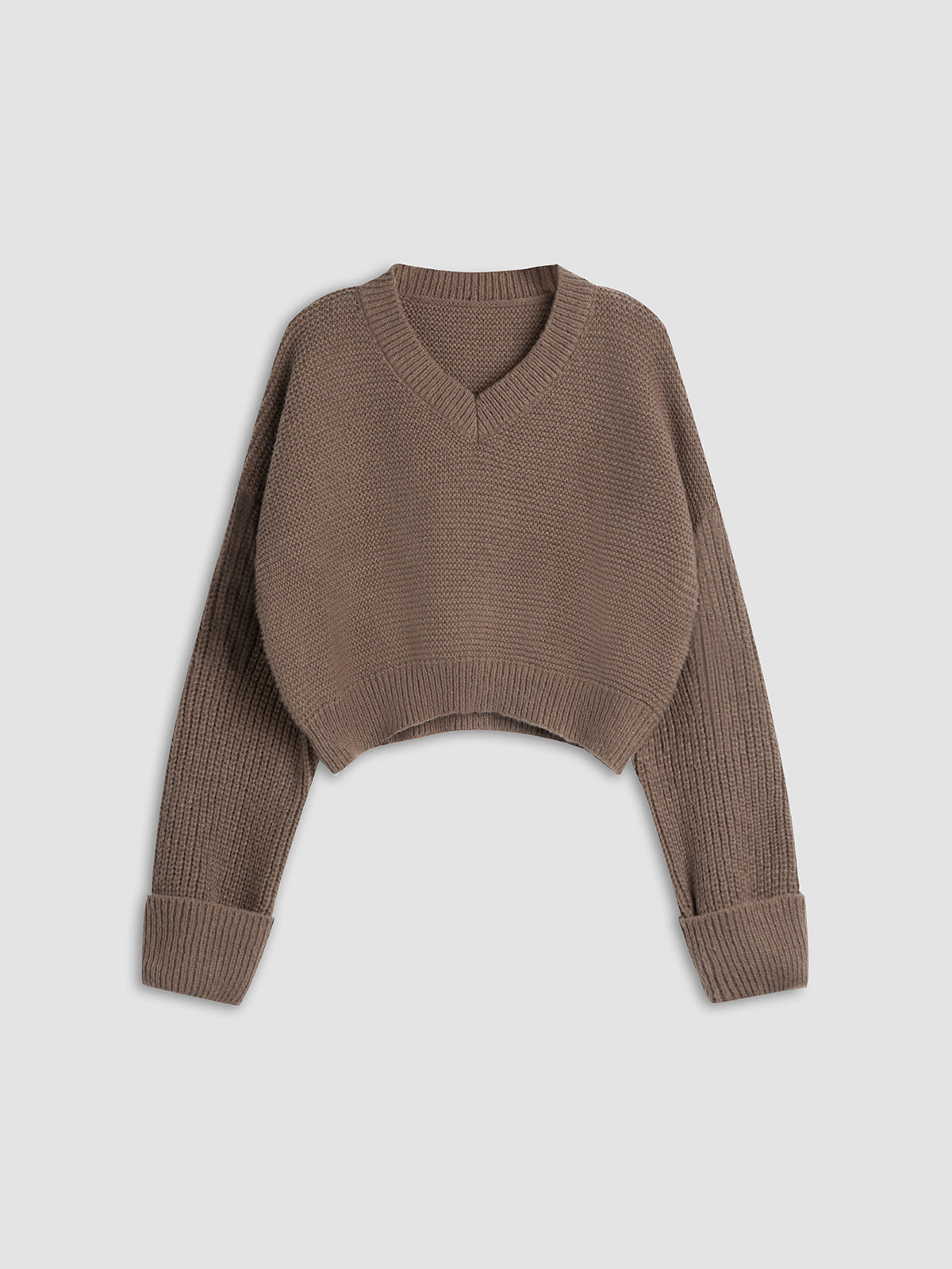 Brauner Strickpullover Damen, V-Ausschnitt, lange Ärmel, modisch, Herbstmode, gemütlich.
