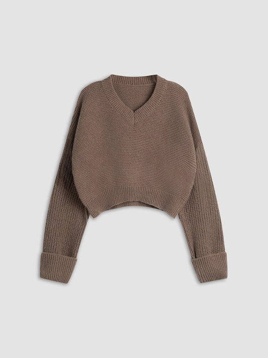 Brauner Strickpullover Damen, V-Ausschnitt, lange Ärmel, modisch, Herbstmode, gemütlich.