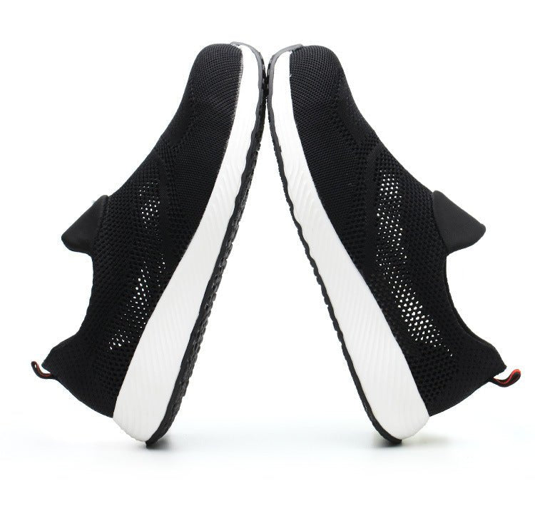 Schwarze Sneaker, atmungsaktiv, robust, stylisch, mit weißer Sohle, für Herren und Damen.