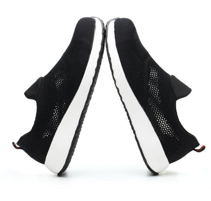 Schwarze Sneaker, atmungsaktiv, robust, stylisch, mit weißer Sohle, für Herren und Damen.