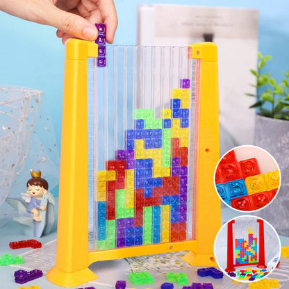 Buntes Tetris-Spielzeug aus Kunststoff, vertikal, mit Bausteinen, gelber Rahmen.