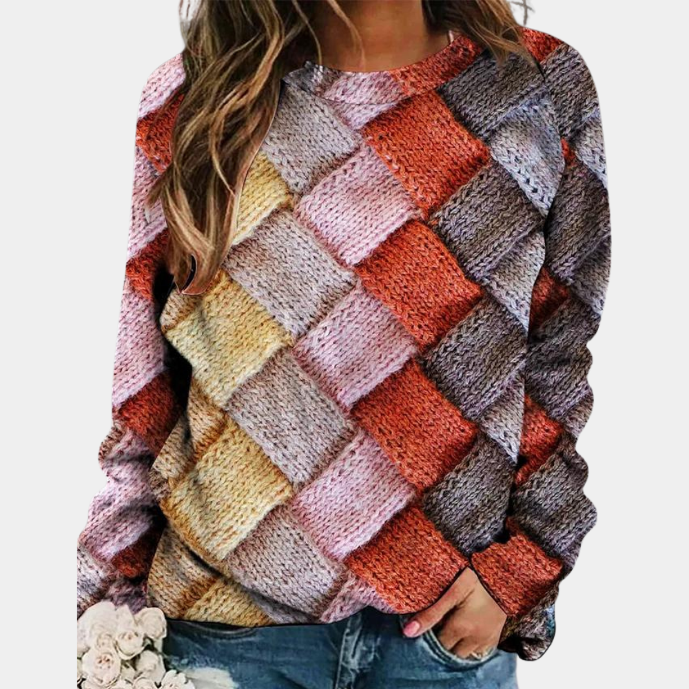 Frau in buntem Strickpullover, Patchwork-Design, lässig, modisch, Herbstmode, Damenbekleidung.