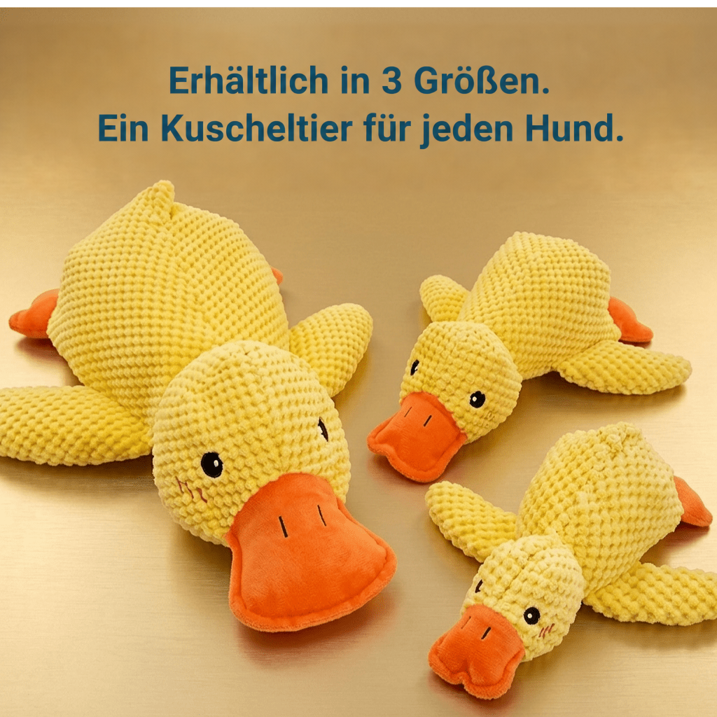 Drei gelbe Plüschenten in drei Größen nebeneinander auf glänzend goldenem Untergrund 4