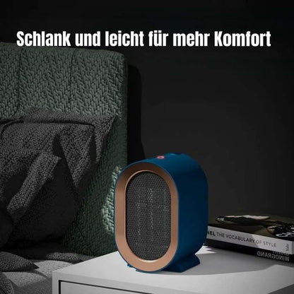 Blauer Heizlüfter mit leuchtender Kontrollanzeige auf einem weißen Nachttisch neben einem Bett im Dunkeln 2