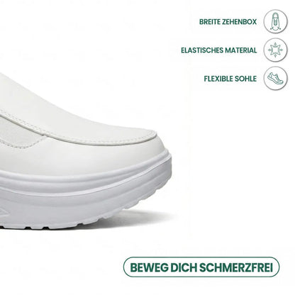Weiße Schuhspitze im Detail mit Gummizug, daneben Symbole zu breiter Spitze und flexibler Sohle 14