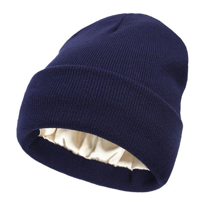 Marineblaue Strickmütze mit Umschlag, innen mit hellem glänzendem Satinfutter ausgestattet 11