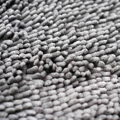 Makroaufnahme der grauen, weichen Chenille-Noppen der Mattenoberfläche. 7