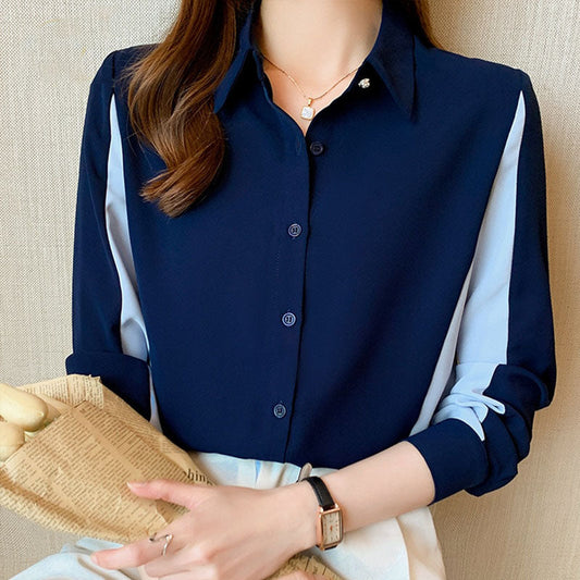 Damenbluse dunkelblau, langärmelig, Knopfleiste, elegantes Design, Büro-Outfit.