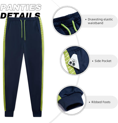 Dunkelblaue Jogginghose mit grünen Streifen, elastischem Bund, Seitentasche, gerippten Bündchen.