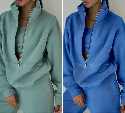 Damen-Sportanzug, zweiteilig, grün und blau, Reißverschluss, Freizeitmode, bequem, stylisch.