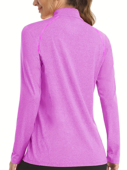 Frau in pinkem Langarm-Sportshirt, atmungsaktiv, feuchtigkeitsableitend, ideal für Fitness.