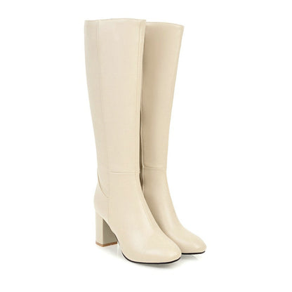 Beige Damenstiefel mit Blockabsatz, elegantes Design, hochwertiges Leder, Reißverschluss.